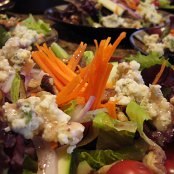 Garden salad featuring blue cheese and walnuts