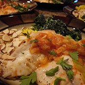 Poached fish with tomato and cumin