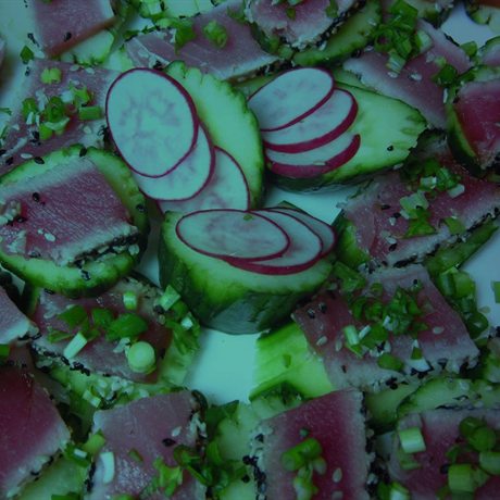 Fresh garden salad with cucumber, radish and herbs
