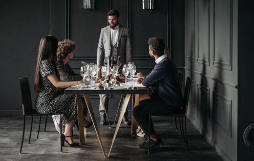 Colleagues dining together at a corporate retreat